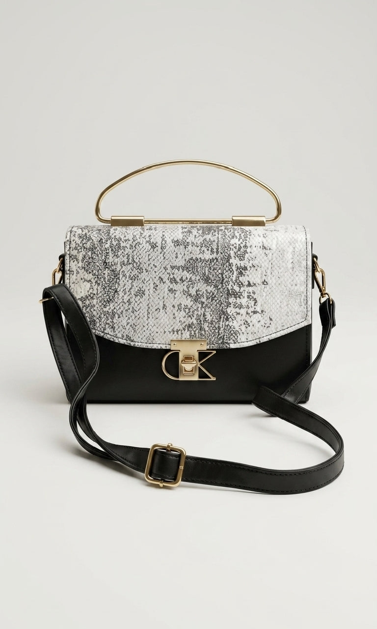 Elegant Black Handbag with Gold Handle