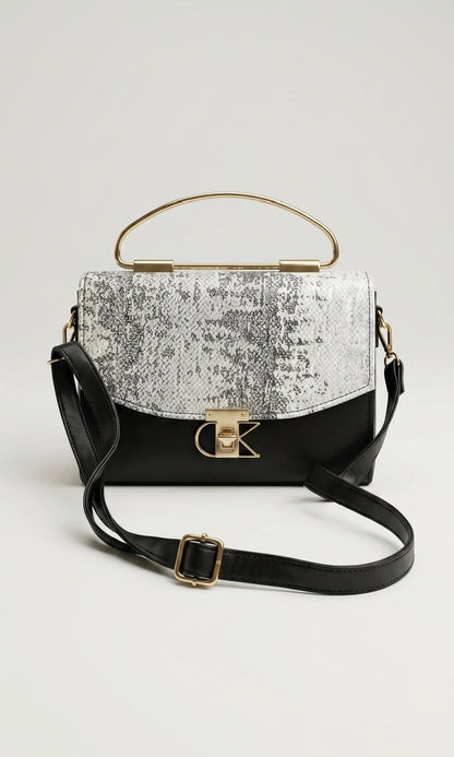 Elegant Black Handbag with Gold Handle