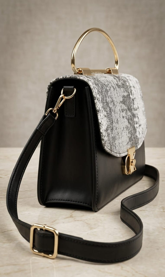 Elegant Black Handbag with Gold Handle